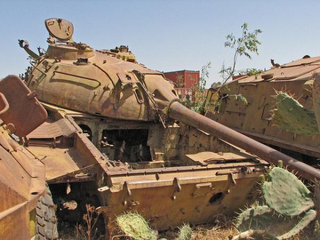 Illustration for article titled Gloomy tank graveyards hold the rusting bones of war